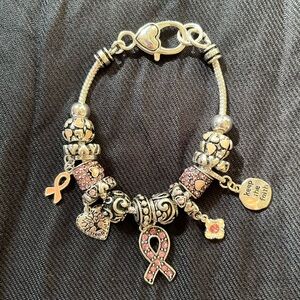 BRAND NEW - Breast Cancer charm bracelet.